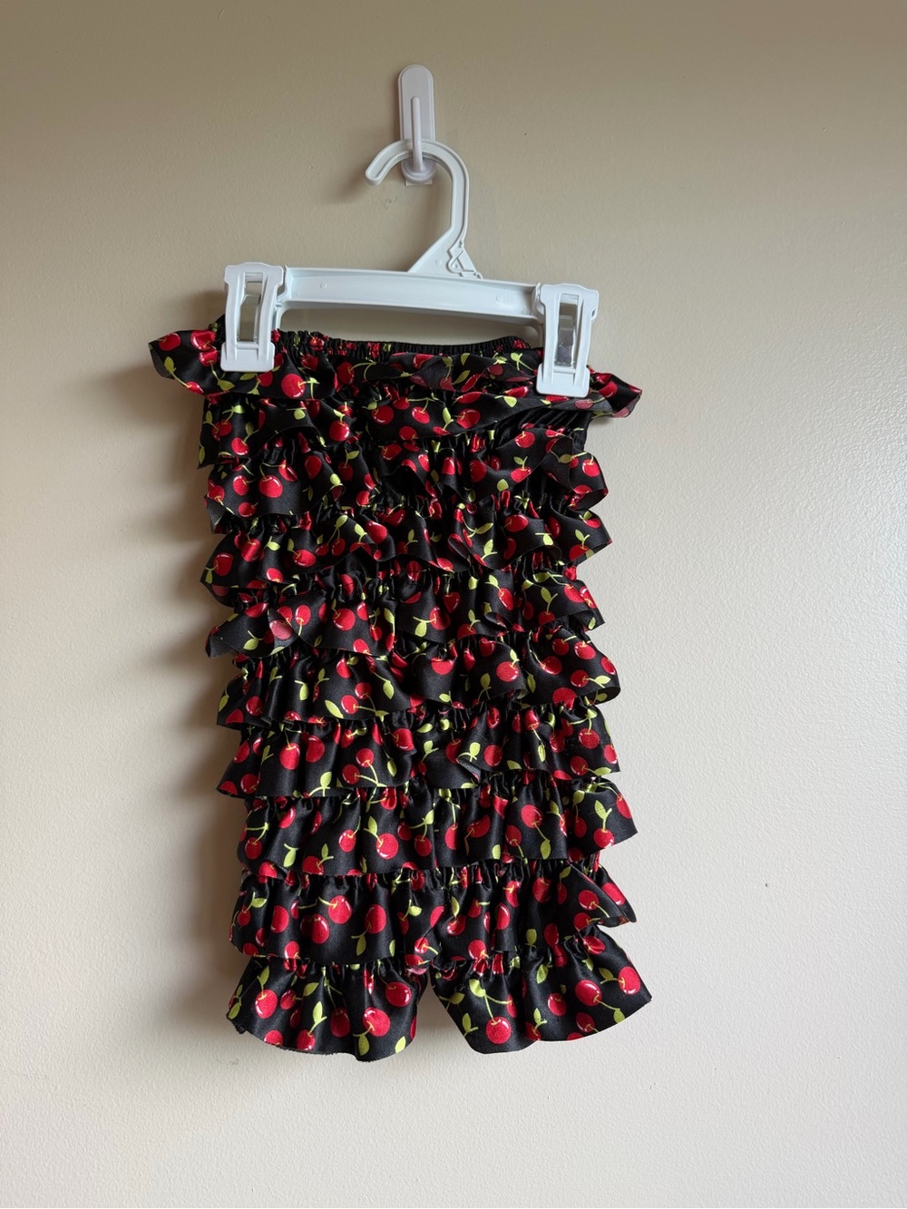 Amazon Kids Black Ruffle One-Piece Ruffle Romber with Red Cherries size 12-18